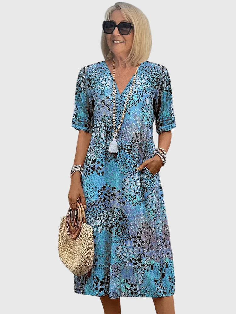 Bella | Blomster elegance midi