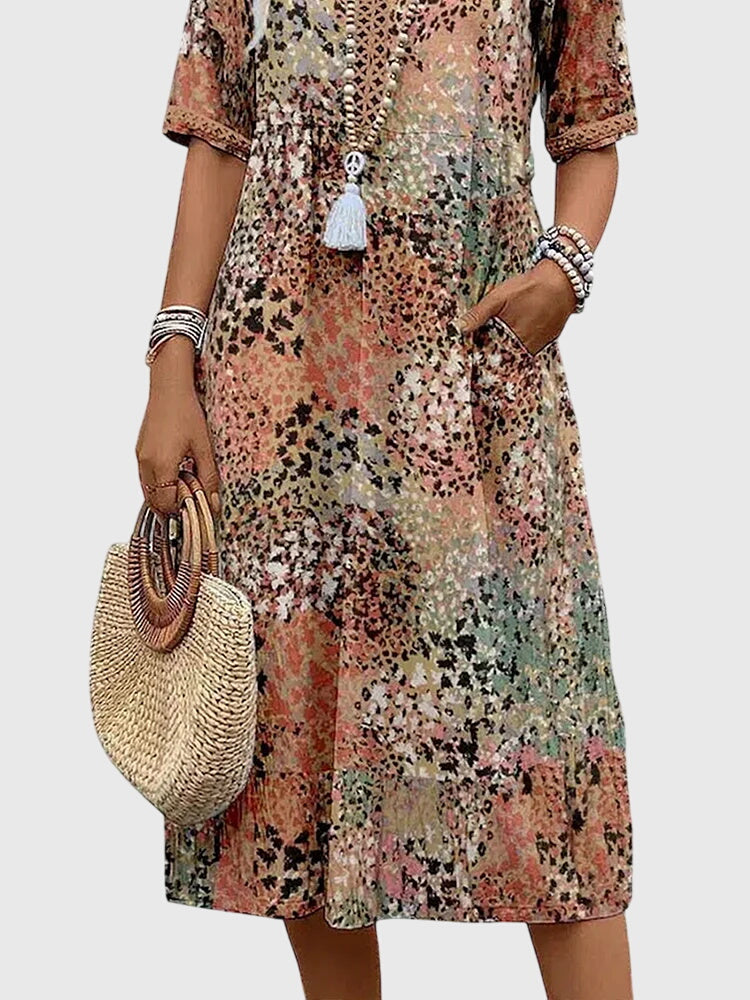 Bella | Blomster elegance midi